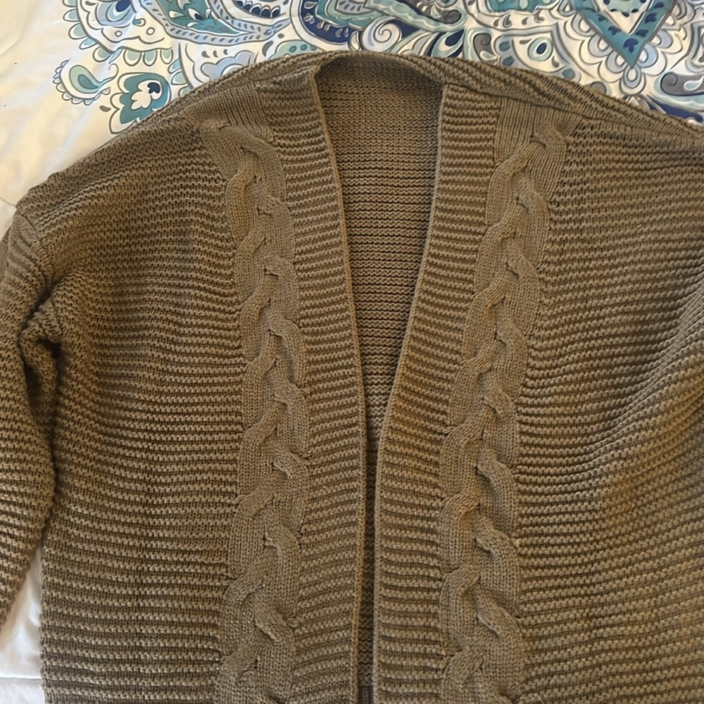 Brand new sweater, color is a brown or dark taupe color. - Picture 3 of 4